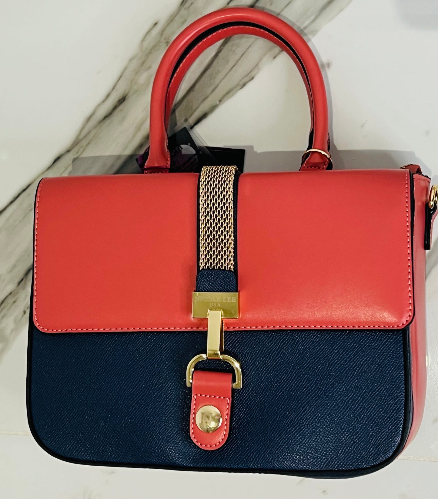 Cartera de mano, Azul y Anaranjado con detalles en oro - Nicole Lee